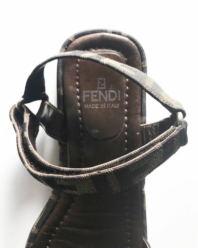 FRUIT Vintage Fendi Zucca monogram flat strap sandals dating to the 1990s, features velcro strap closure.