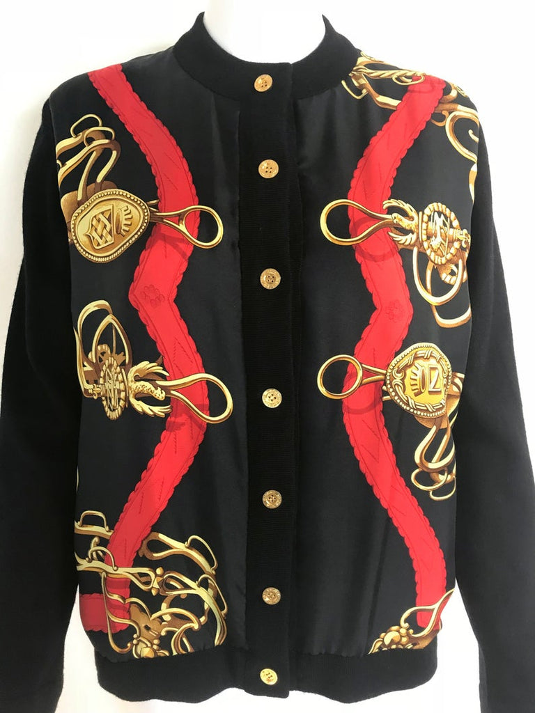 FRUIT Vintage Hermes classic in near mint condition, this cardigan is a beautiful piece of vintage Hermes history! It features an equestrian inspired silk scarf print at the front, full wool rear and gold logo buttons.