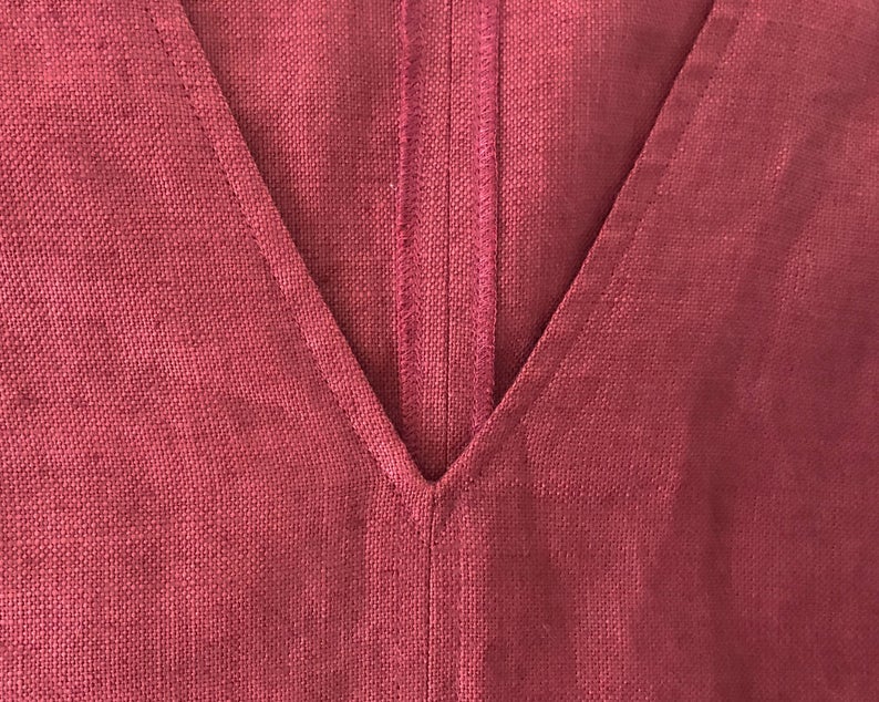 FRUIT Vintage Yves Saint Laurent Rive Gauche red maroon linen tunic dress dating to the 1980s. In near mint condition, this piece features a a classic shift/tunic silhouette with a gorgeous low, open back.