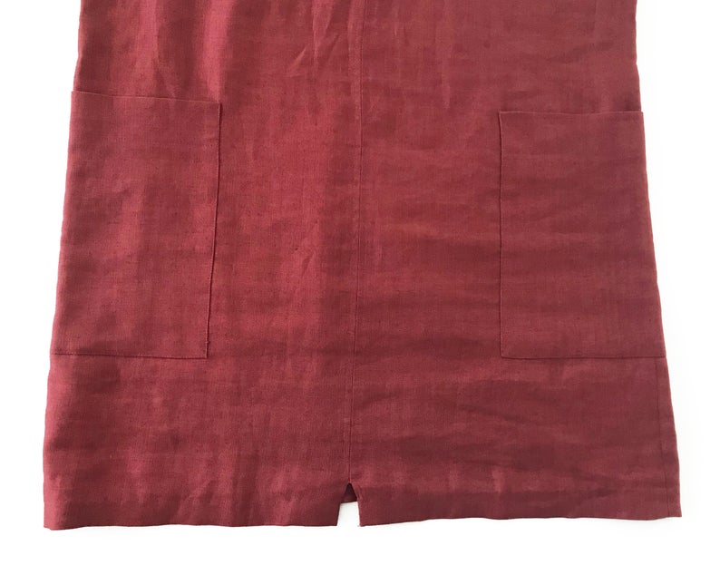 FRUIT Vintage Yves Saint Laurent Rive Gauche red maroon linen tunic dress dating to the 1980s. In near mint condition, this piece features a a classic shift/tunic silhouette with a gorgeous low, open back.