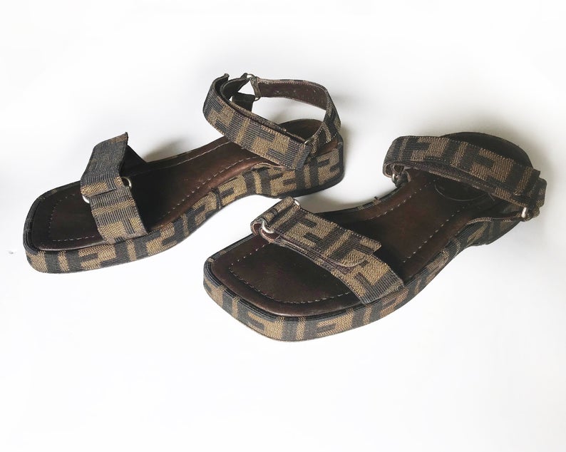 FRUIT Vintage Fendi Zucca monogram flat strap sandals dating to the 1990s, features velcro strap closure.