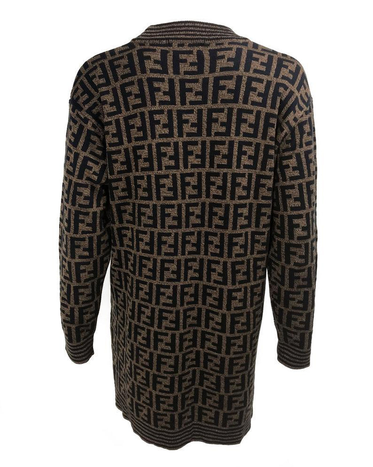 FRUIT vintage Fendi Zucca design sweater dating to the 1990s. This monogram knit features side splits and striped design on sleeves and neck. The logo is knitted into the jumper (intarsia style), the design is cut for a long-line, slightly oversized fit.