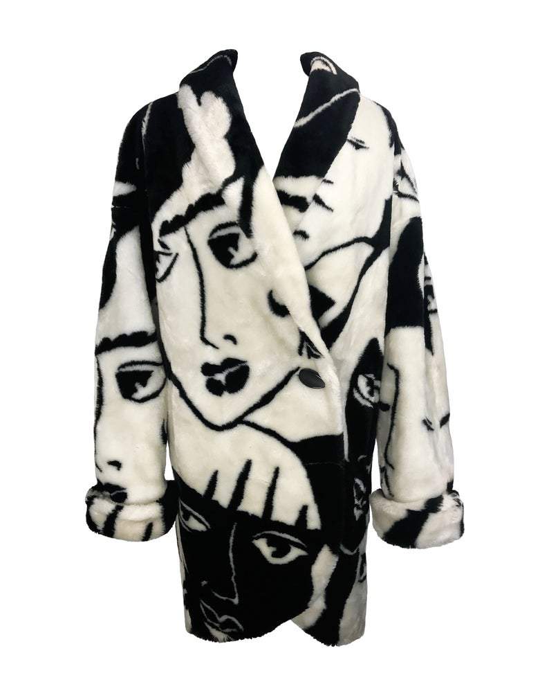 Fruit Vintage Donnybrook Faces Coat. Original 1980s Faux Fur cocoon coat with a relaxed, oversized silhouette. Features bold beige/black graphic custom Donnybrook face print.