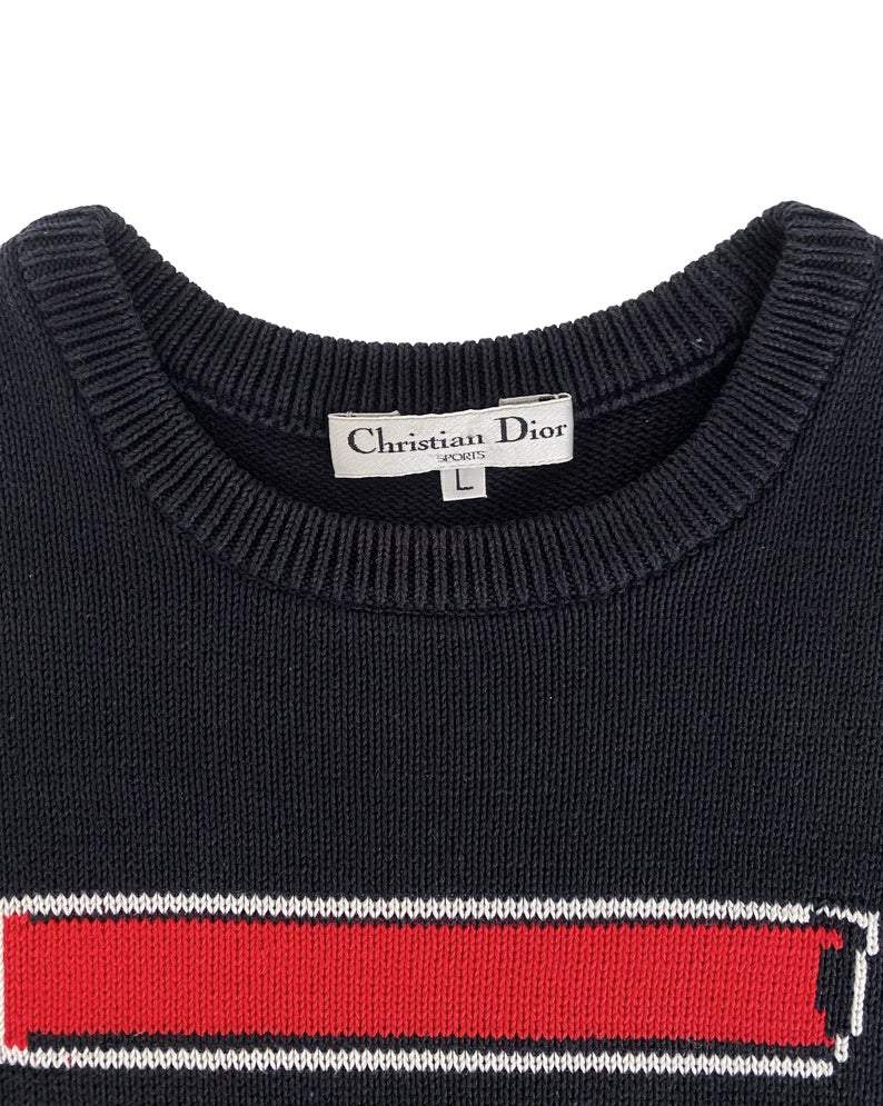 Fruit Vintage 1980s Christian Dior Sports Logo Knitted sweater. It features a large embroidered logo design at front and classic sweater knit cut.