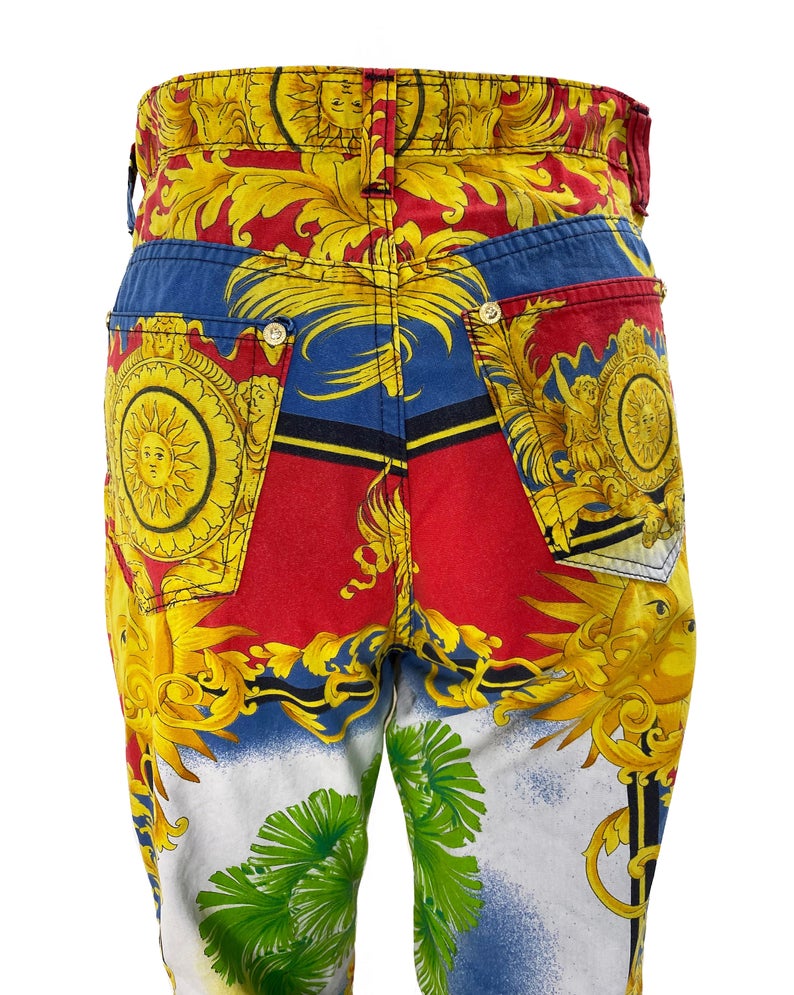 FRUIT Vintage Versace pants from the Jeans Couture collection. This is a lifetime Gianni Versace piece from the 1990s, it features the iconic 'Baroque' Print with Miami palms at the rear.