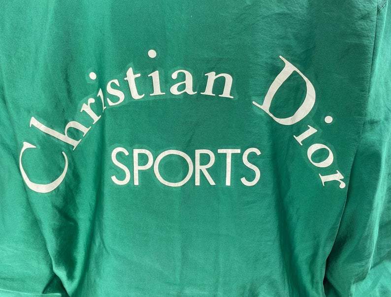 FRUIT vintage rare Christian Dior Sports Green Logo bomber jacket from the 1980s. It features a classic 1980s bomber jacket cut, and large Christian Dior Sport text logo printed at rear.