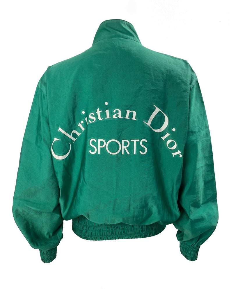 FRUIT vintage rare Christian Dior Sports Green Logo bomber jacket from the 1980s. It features a classic 1980s bomber jacket cut, and large Christian Dior Sport text logo printed at rear.