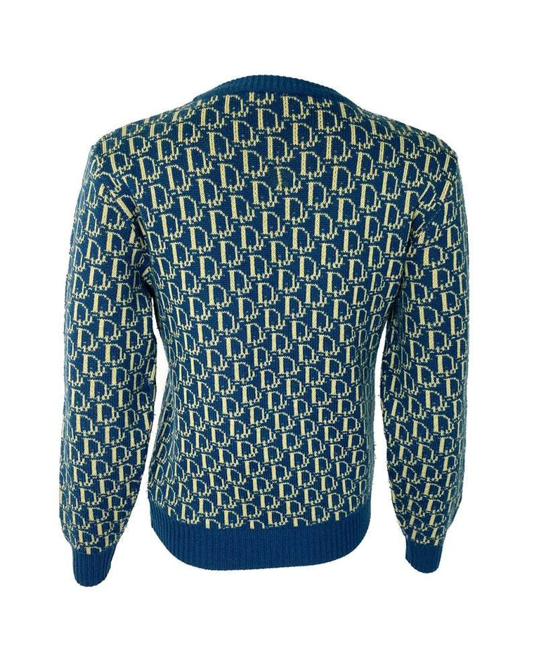 Fruit Vintage 1980s Christian Dior rare navy logo knit sweater. It features the iconic oblique print knitted into the weave of the fabric all over and a classic sweater cut.