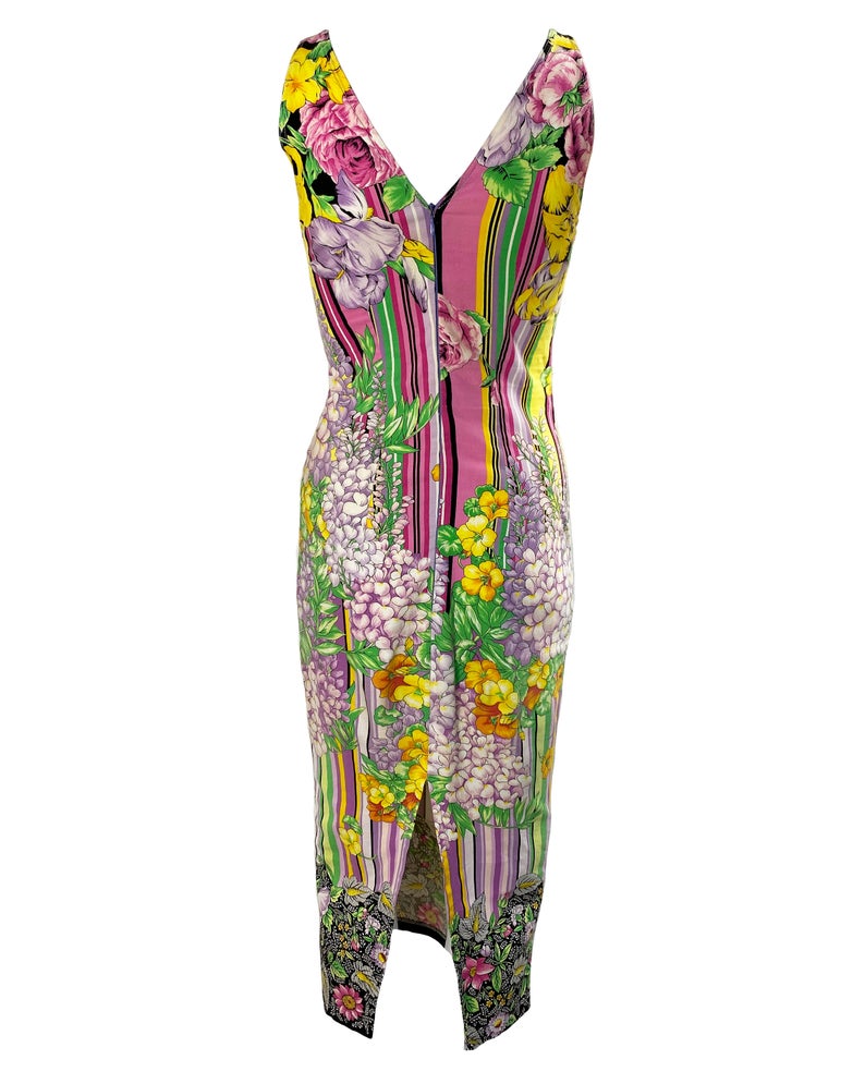 FRUIT Vintage Versus Versace dress designed by Gianni Versace in the 1990s. This graphic, floral print midi dress features a bold pattern on pattern print of floral and tailored cut.