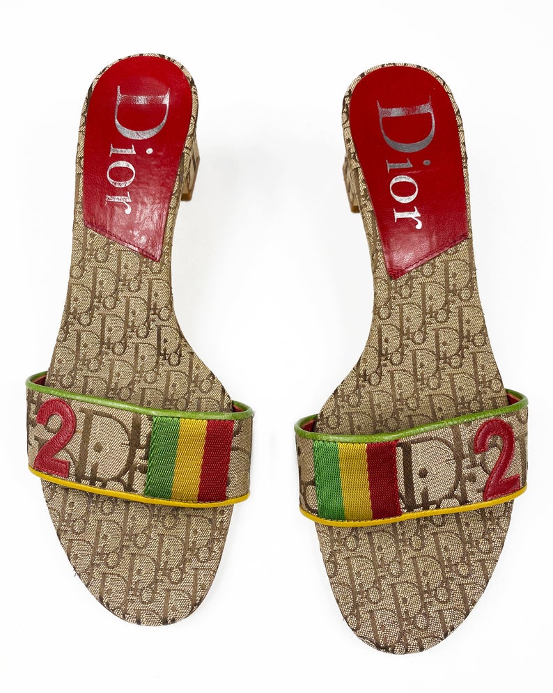 Fruit Vintage Christian Dior rasta logo kitten heel mules in monogram canvas. They feature the iconic Dior number in leather appliqué and racing stripes in cotton twill.