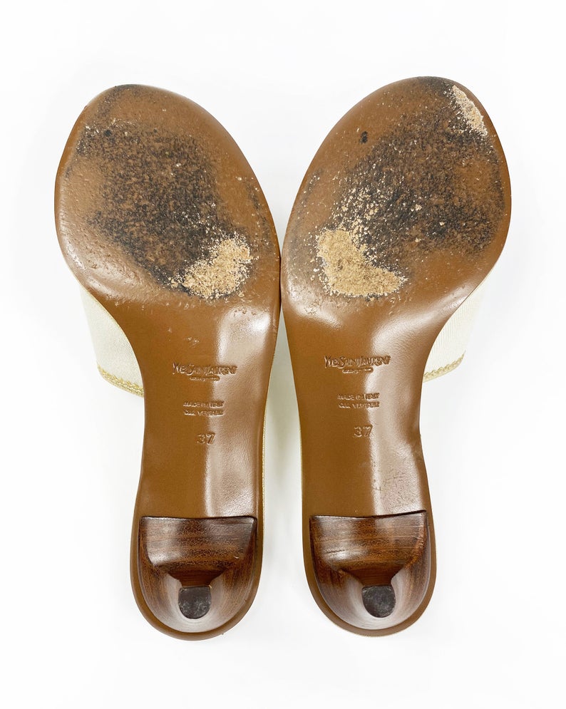 FRUIT Vintage Yves Saint Laurent logo canvas mules with gold leather trim. Features a a large gold leather YSL logo at front and stacked wooden heels.